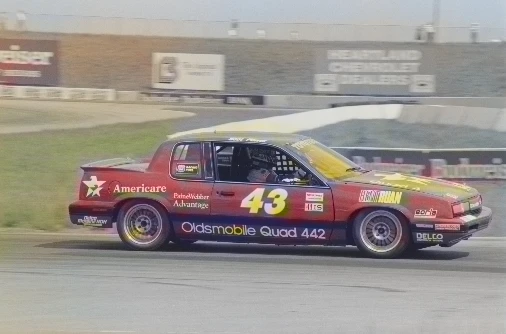 Actual colorized output from the project notebook: a vintage stock car